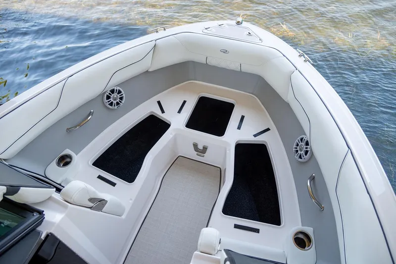 Slide: The Image of Manufacturer Provided Image: Luxurious 2026 Regal LX2 boat interior with sleek seating and modern design. - 11