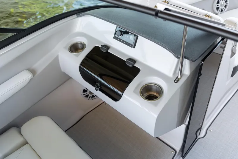 Slide: The Image of Manufacturer Provided Image: 2026 Regal LX2 boat dashboard with modern steering wheel and digital display. - 5