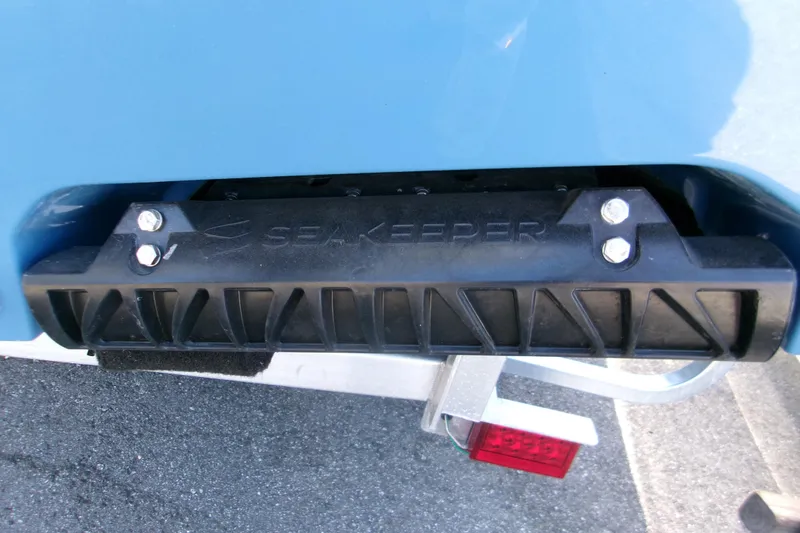 Slide: The Image of Seakeeper stabilizer on 2025 Sportsman Open 252 Center Console boat. - 17