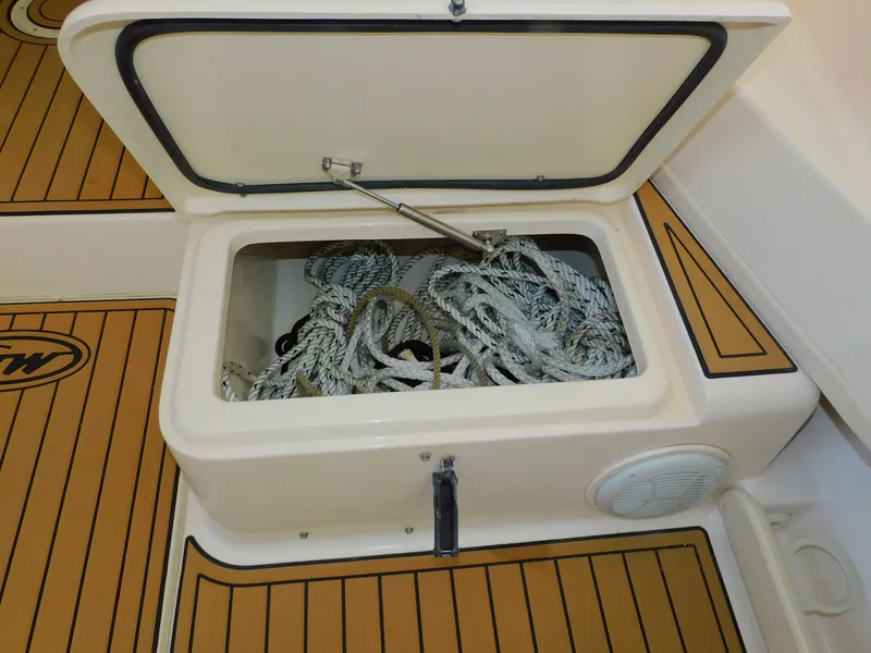 Slide: The Image of Storage compartment with ropes on Grady-White Gulfstream 232 boat, year 2012. - 16