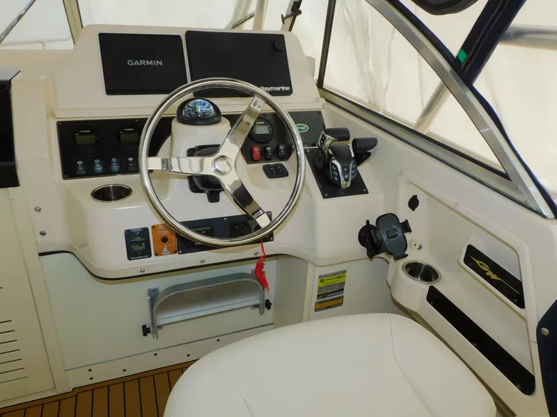 Slide: The Image of Grady-White Gulfstream 232 helm, 2012 model, featuring Garmin navigation. - 20