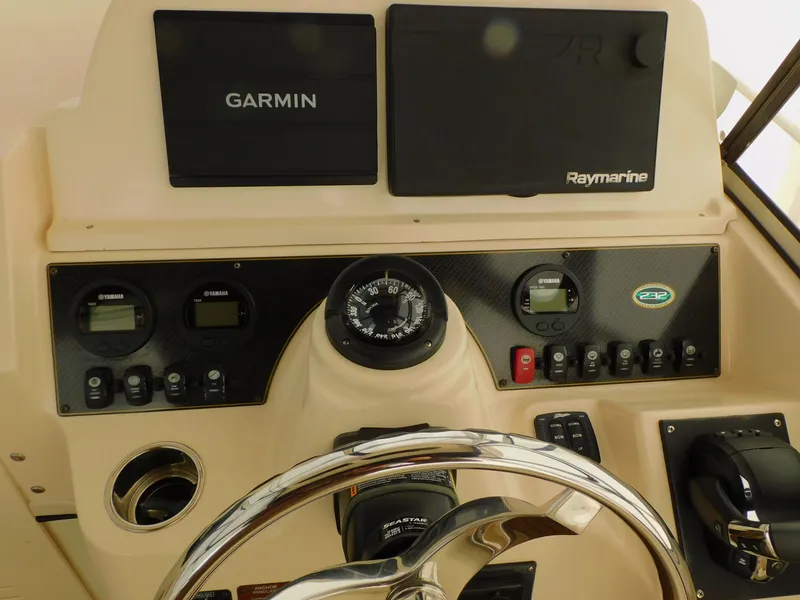 Slide: The Image of Control console of a 2012 Grady-White Gulfstream 232 boat. - 26