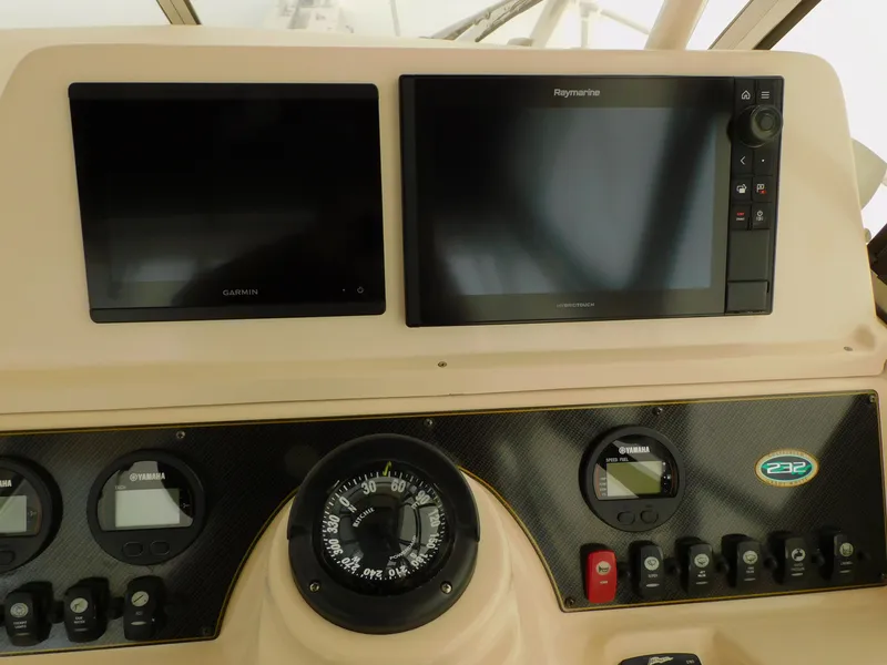 Slide: The Image of Dashboard of a 2012 Grady-White Gulfstream 232 boat. - 27