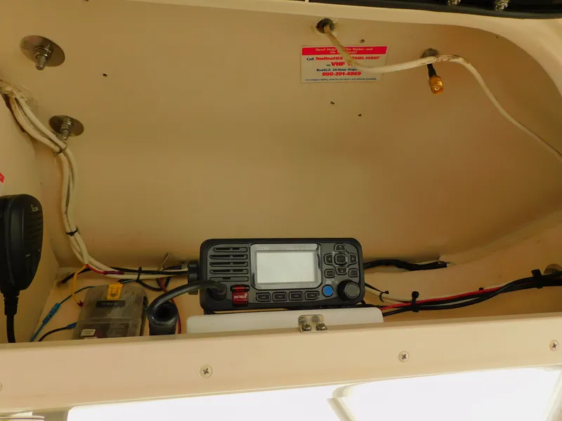 Slide: The Image of Interior view of Grady-White Gulfstream 232 boat, showing radio and wiring. - 35