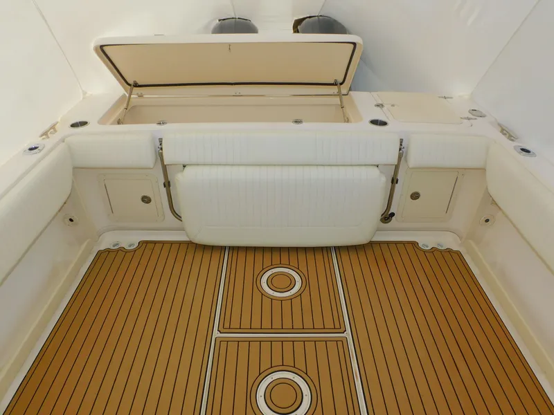 Slide: The Image of Grady-White Gulfstream 232, 2012, boat cabin with wooden flooring. - 43