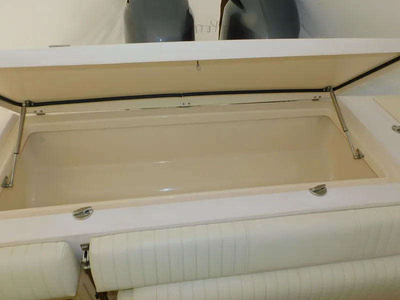 Slide: The Image of Open storage compartment on 2012 Grady-White Gulfstream 232 boat. - 47
