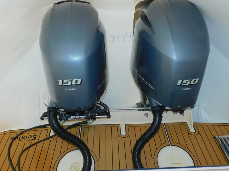 Slide: The Image of Two Yamaha 150 outboard engines on Grady-White Gulfstream 232, year 2012. - 50