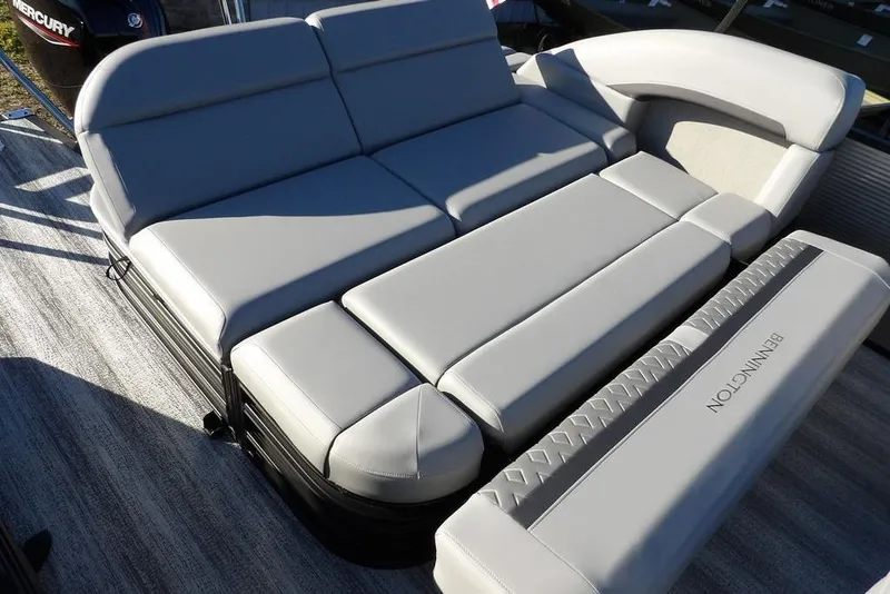 Slide: The Image of 2026 Bennington M Swingback 22 MSB boat with luxurious gray seating. - 31