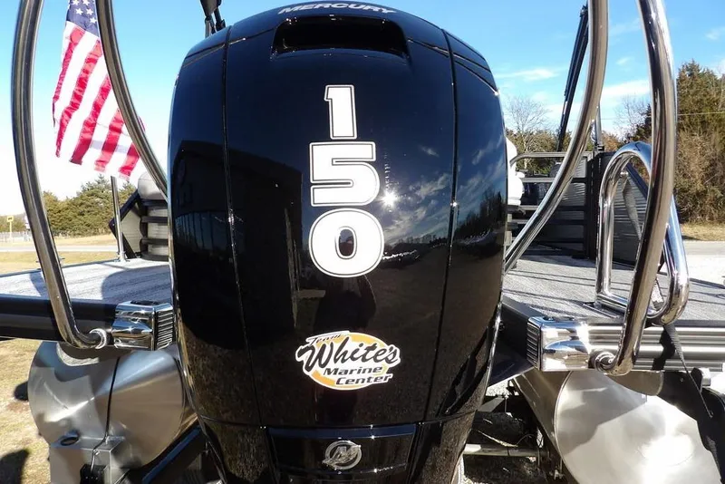 Slide: The Image of 2026 Bennington M Swingback 22 MSB with Mercury 150 engine and American flag. - 41