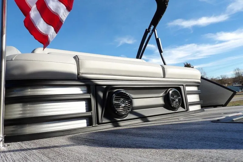 Slide: The Image of 2026 Bennington M Swingback 22 MSB pontoon boat with speakers and American flag. - 43
