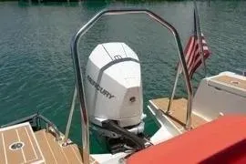 Slide: The Image of Storage compartment of a 2021 Nimbus T8 boat, featuring various equipment and supplies. - 24