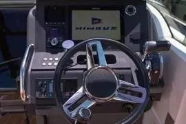 Slide: The Image of 2021 Nimbus T8 storage compartment with organized equipment and supplies. - 32