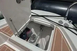 Slide: The Image of Red seating on a 2021 Nimbus T8 boat deck. - 34