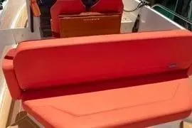 Slide: The Image of Steering wheel and dashboard of 2021 Nimbus T8 boat with navigation display. - 35