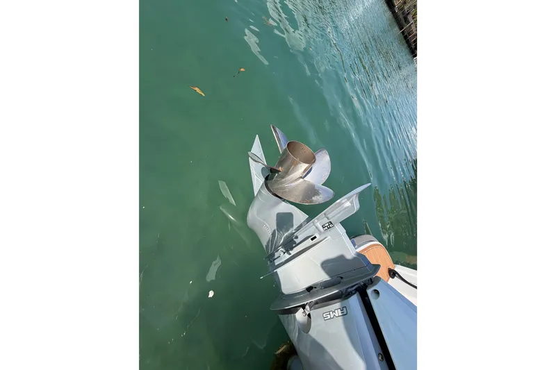 Slide: The Image of Outboard motor propeller of 2021 Nimbus T8 in clear water. - 53