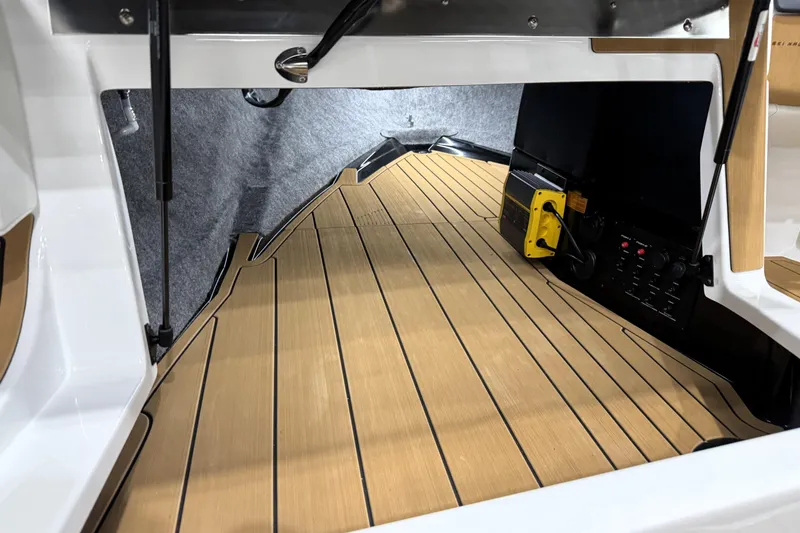Slide: The Image of 2026 Nautique Ski Nautique interior with sleek wooden flooring and modern equipment. - 15