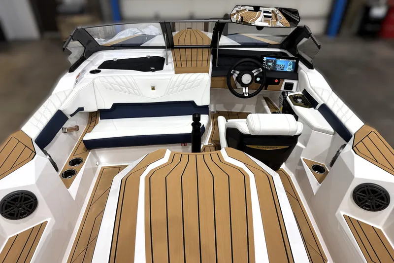 Slide: The Image of 2026 Nautique Ski Nautique interior with sleek design, modern dashboard, and luxurious seating. - 30