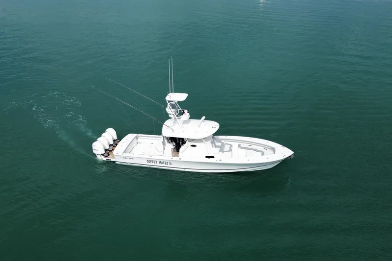 Slide: The Image of 2018 Regulator 41 boat cruising on calm waters, aerial view. - 12
