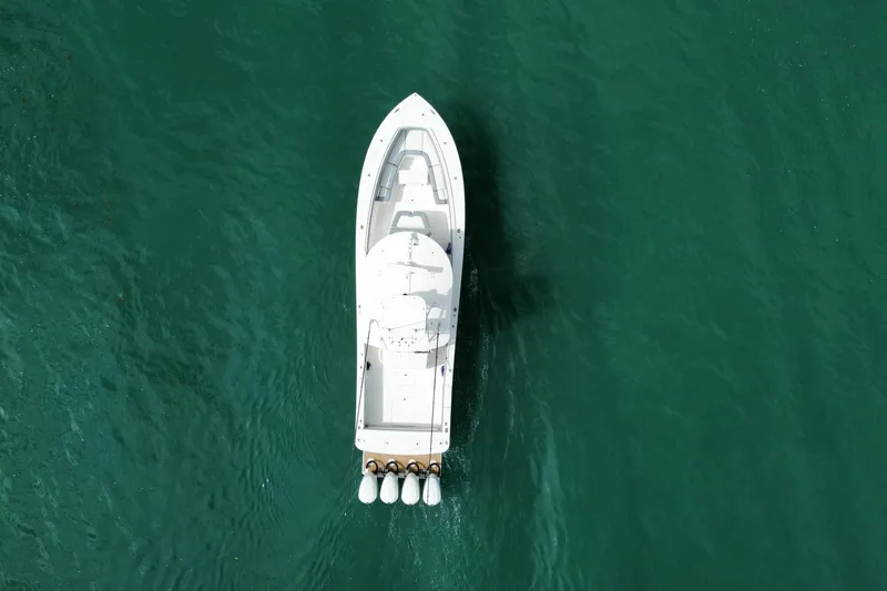 Slide: The Image of Aerial view of 2018 Regulator 41 boat on turquoise water. - 14