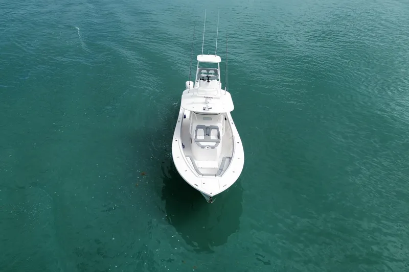 Slide: The Image of Aerial view of 2018 Regulator 41 boat on calm turquoise water. - 17