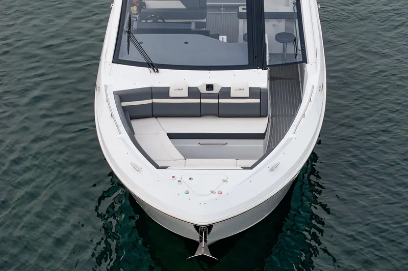 Slide: The Image of 2022 Cruisers 42 GLS luxury yacht on calm water, sleek design, modern features. - 13