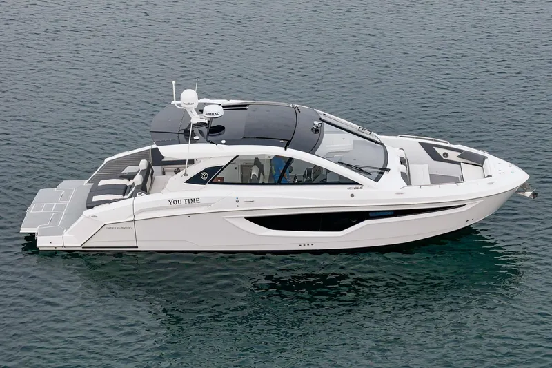 Slide: The Image of 2022 Cruisers 42 GLS yacht with spacious deck and seating, cruising in Alamitos Bay. - 17