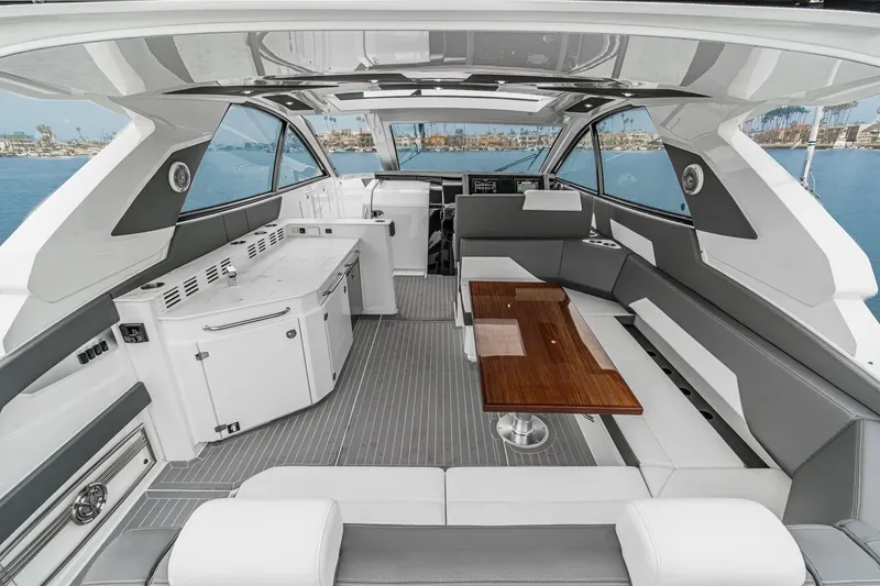 Slide: The Image of 2022 Cruisers 42 GLS luxury yacht with spacious deck and modern amenities. - 18