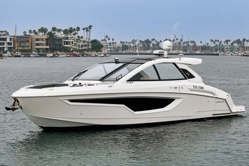 Slide: The Image of Aerial view of 2022 Cruisers 42 GLS yacht on open water. - 4