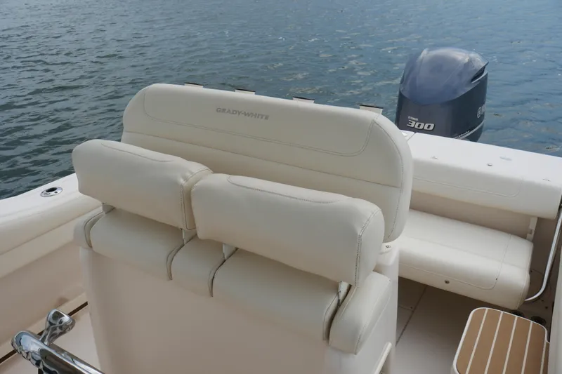 Slide: The Image of 2021 Grady-White Fisherman 236 boat interior with Yamaha 300 engine on water. - 11