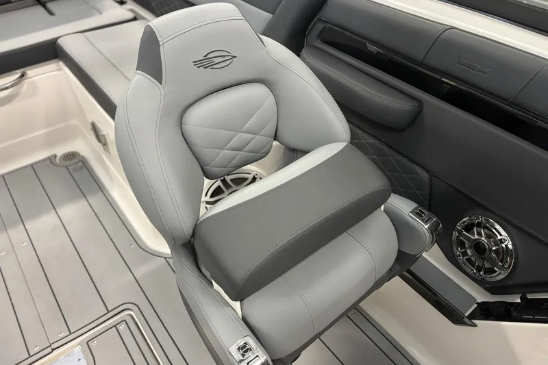 Slide: The Image of 2026 Chaparral SSX 6 boat interior with luxurious gray seating and modern design. - 20