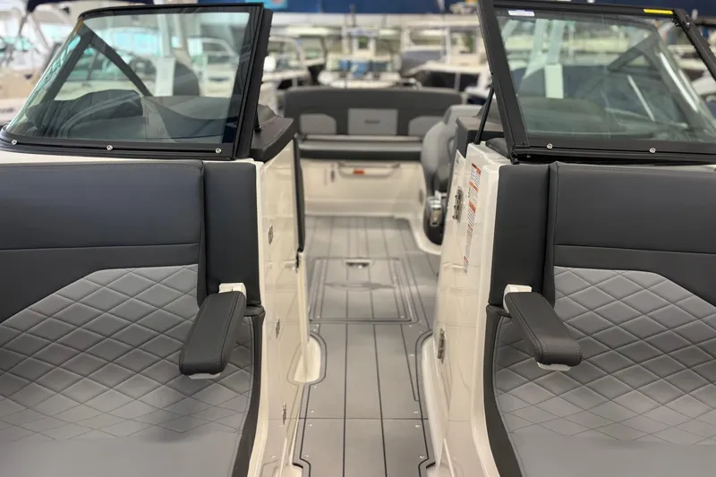 Slide: The Image of 2026 Chaparral SSX 6 boat interior with sleek seating and modern design. - 35