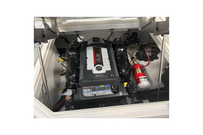 Slide: The Image of 2026 Chaparral SSX 6 engine compartment with Mercury 6.2L engine and fire extinguisher. - 37