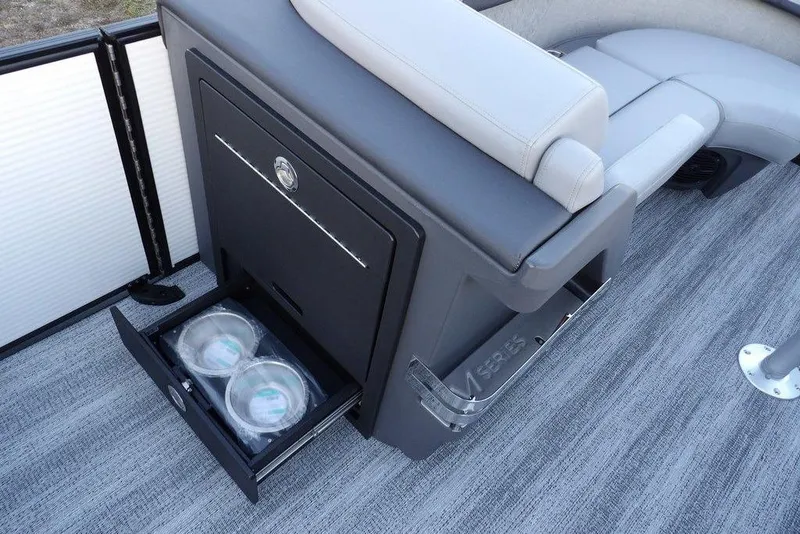 Slide: The Image of 2026 Bennington M Swingback 22 MSB boat interior with storage drawer and seating. - 17