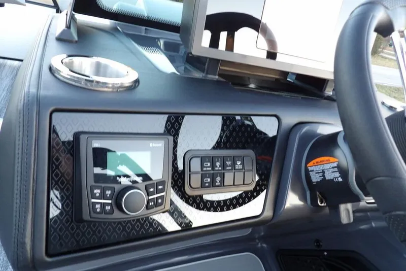 Slide: The Image of Dashboard of 2026 Bennington M Swingback 22 MSB with control panel and steering wheel. - 23