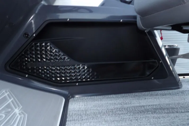 Slide: The Image of 2026 Bennington M Swingback 22 MSB interior detail with textured panel and seating. - 26