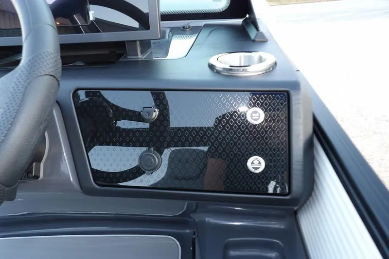 Slide: The Image of Dashboard of 2026 Bennington M Swingback 22 MSB with modern controls and cup holder. - 27