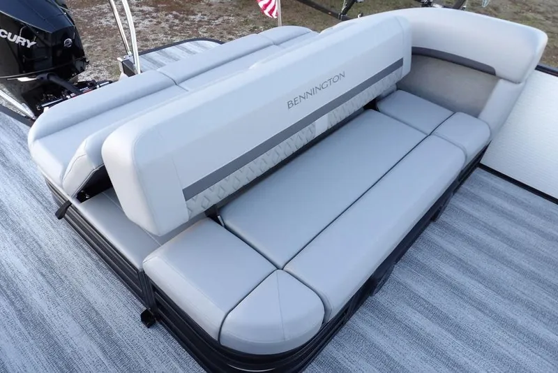 Slide: The Image of 2026 Bennington M Swingback 22 MSB boat with luxurious gray seating. - 33