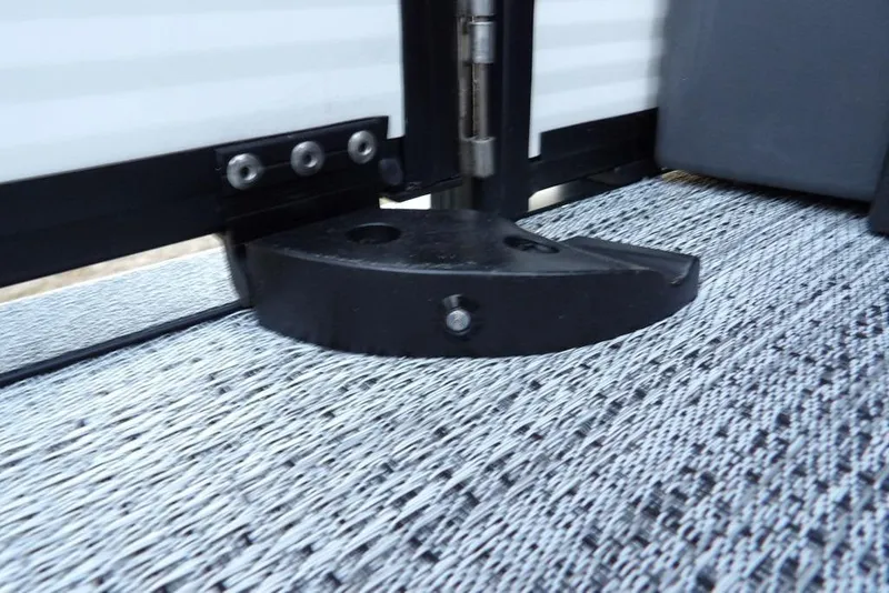 Slide: The Image of Close-up of Bennington M Swingback 22 MSB 2026 boat hinge on textured flooring. - 39