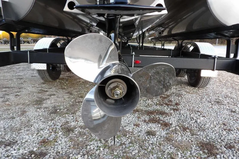 Slide: The Image of Propeller of 2026 Bennington M Swingback 22 MSB pontoon boat on trailer. - 43