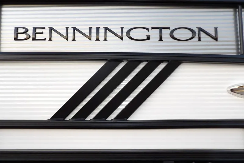 Slide: The Image of 2026 Bennington M Swingback 22 MSB logo on sleek, modern boat design. - 53