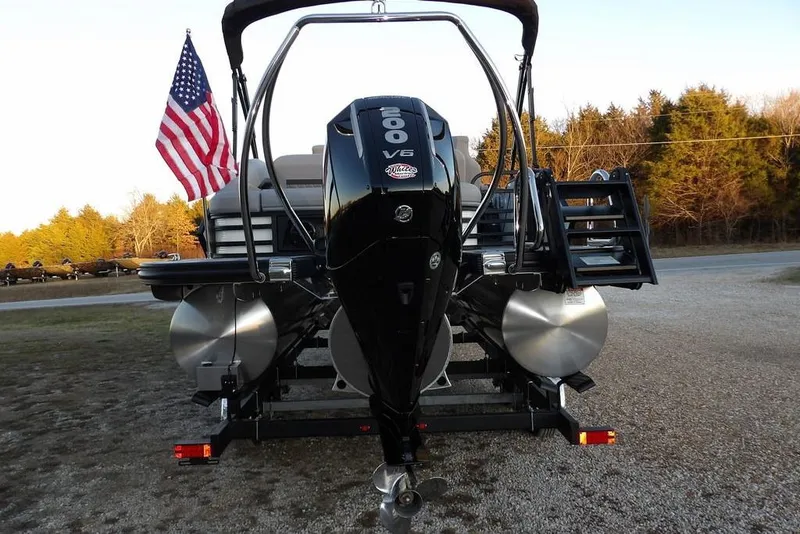Slide: The Image of 2026 Bennington M Swingback 22 MSB pontoon boat with V6 engine and American flag. - 7