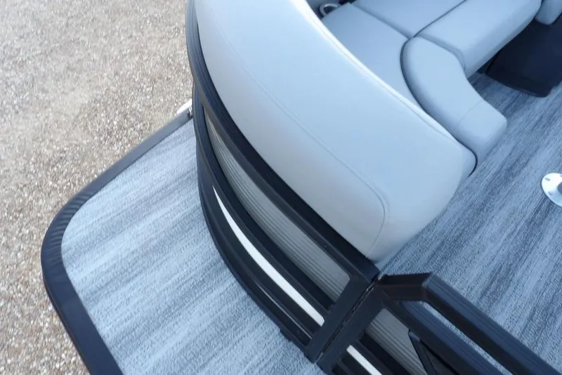 Slide: The Image of 2026 Bennington M Swingback 22 MSB boat interior with gray seating and flooring. - 8