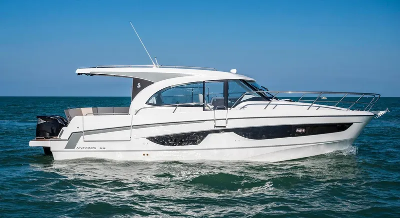 Slide: The Image of 2026 Beneteau Antares 11 cruising on open water, side view. - 4