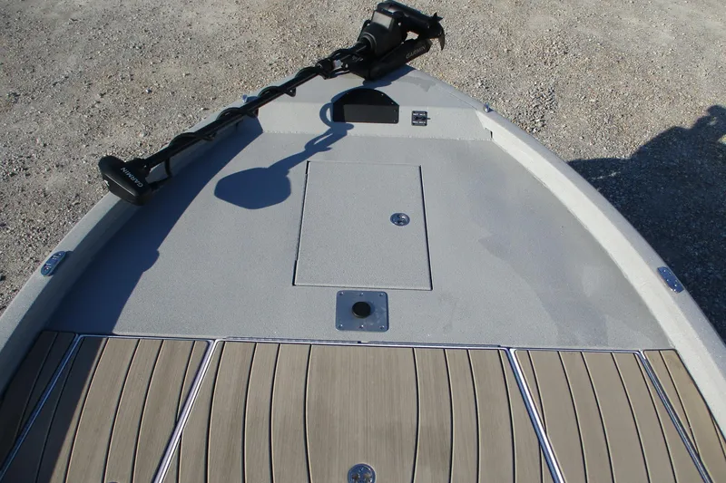Slide: The Image of 2026 Vexus ACX2210 boat deck with Garmin trolling motor, featuring sleek design and wood finish. - 12