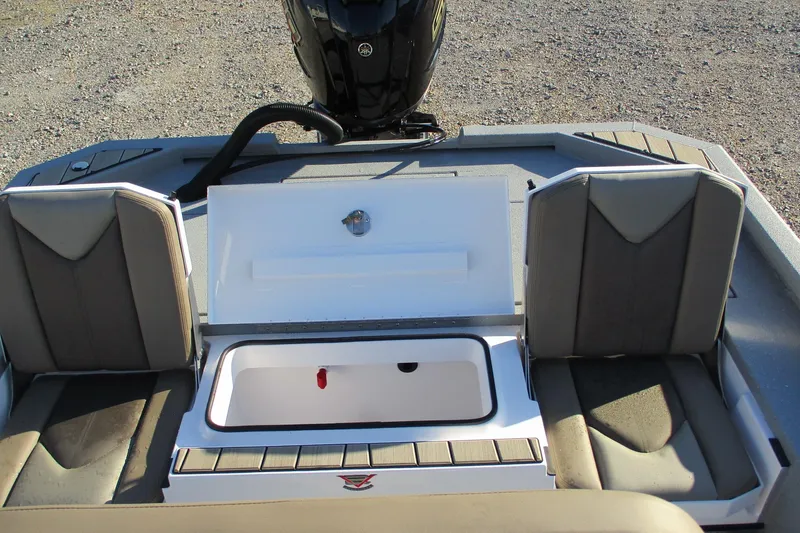 Slide: The Image of 2026 Vexus ACX2210 boat interior with open storage compartment and seating. - 14