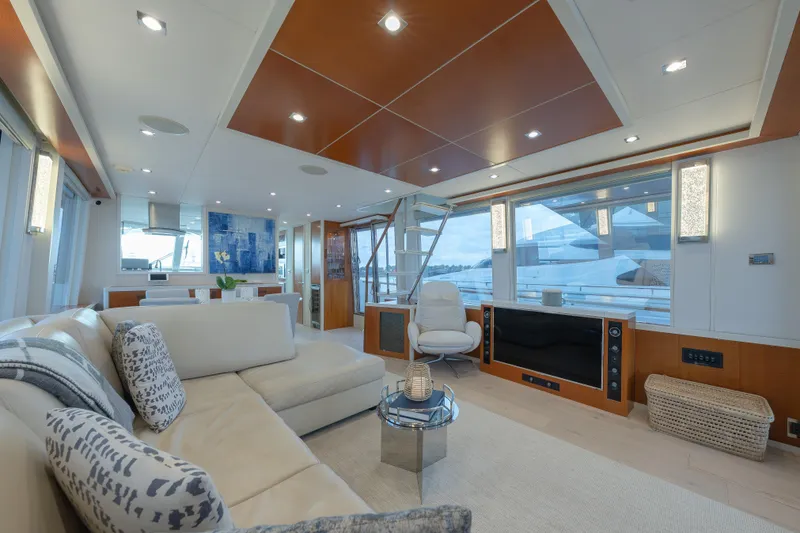 Slide: The Image of Luxurious interior of 2012 Lazzara Breeze yacht with modern furnishings and large windows. - 1
