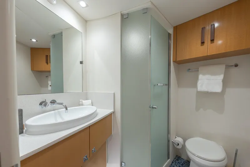 Slide: The Image of Luxurious 2012 Lazzara Breeze yacht bathroom with modern fixtures and elegant design. - 23