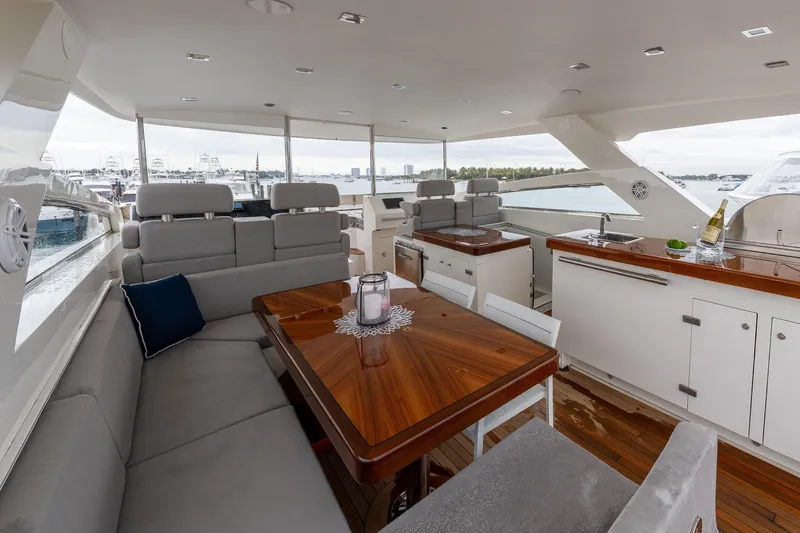 Slide: The Image of Luxurious 2012 Lazzara Breeze yacht interior with elegant seating and dining area. - 30
