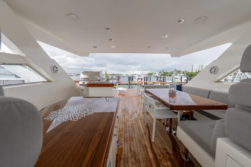 Slide: The Image of Luxurious 2012 Lazzara Breeze yacht interior with elegant seating and dining area. - 32