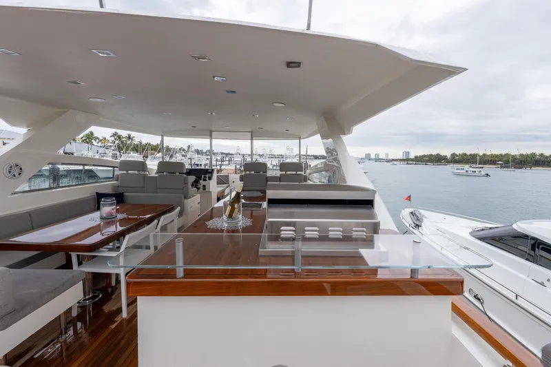 Slide: The Image of Luxurious 2012 Lazzara Breeze yacht deck with seating and ocean view. - 34